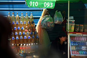 Stall selling bottles of home brewed fuel 