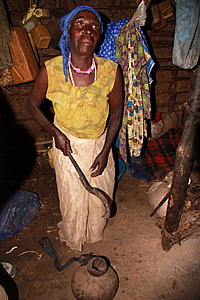 Adimo shows us around her hut 