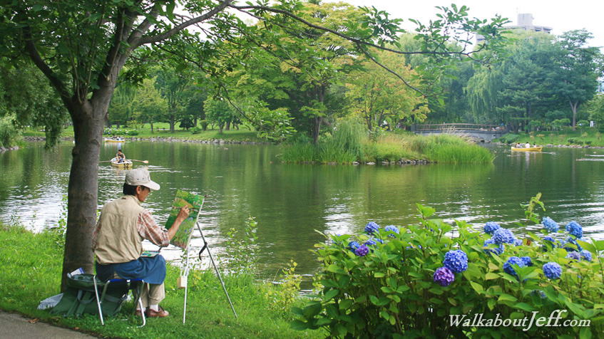 Painter by the lake