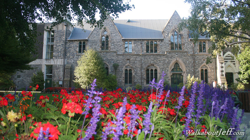 Flowers and a stone building